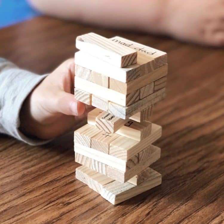 Using games like Jenga to enhance instruction in kindergarten.